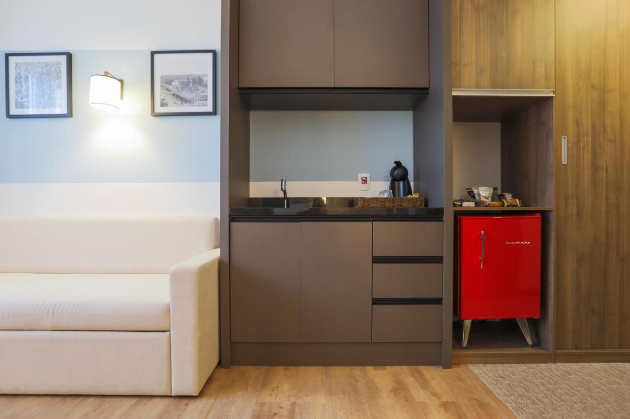 Tryp By Wyndham Ribeirao Preto Hotel Exterior photo A kitchenette in a hotel room